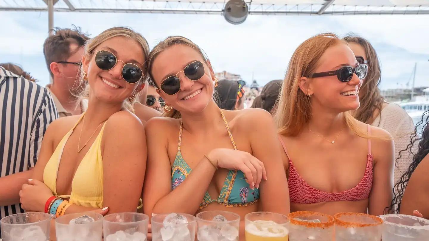 Students partying at a spring break club event