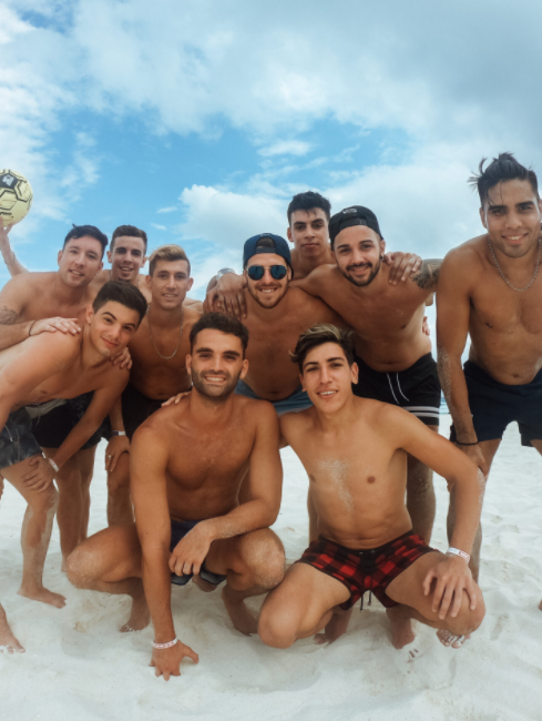 group of men at beach