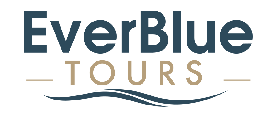 Logo for "EverBlue Tours" inspired by Go Blue Tours, featuring "EverBlue" in bold blue letters and "TOURS" in beige capitals. Two beige horizontal lines and a blue wave graphic accent the design below the text.